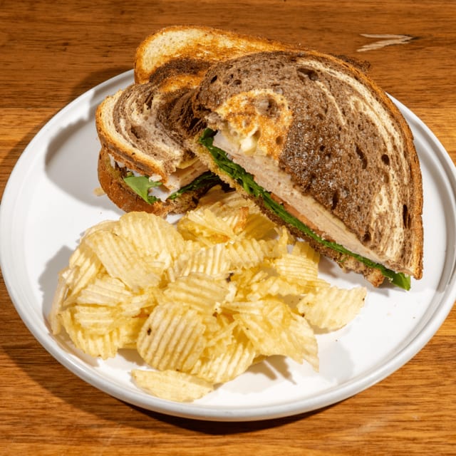 Turkey Pesto with Fontina Cheese & Lettuce and Tomato Sandwich.